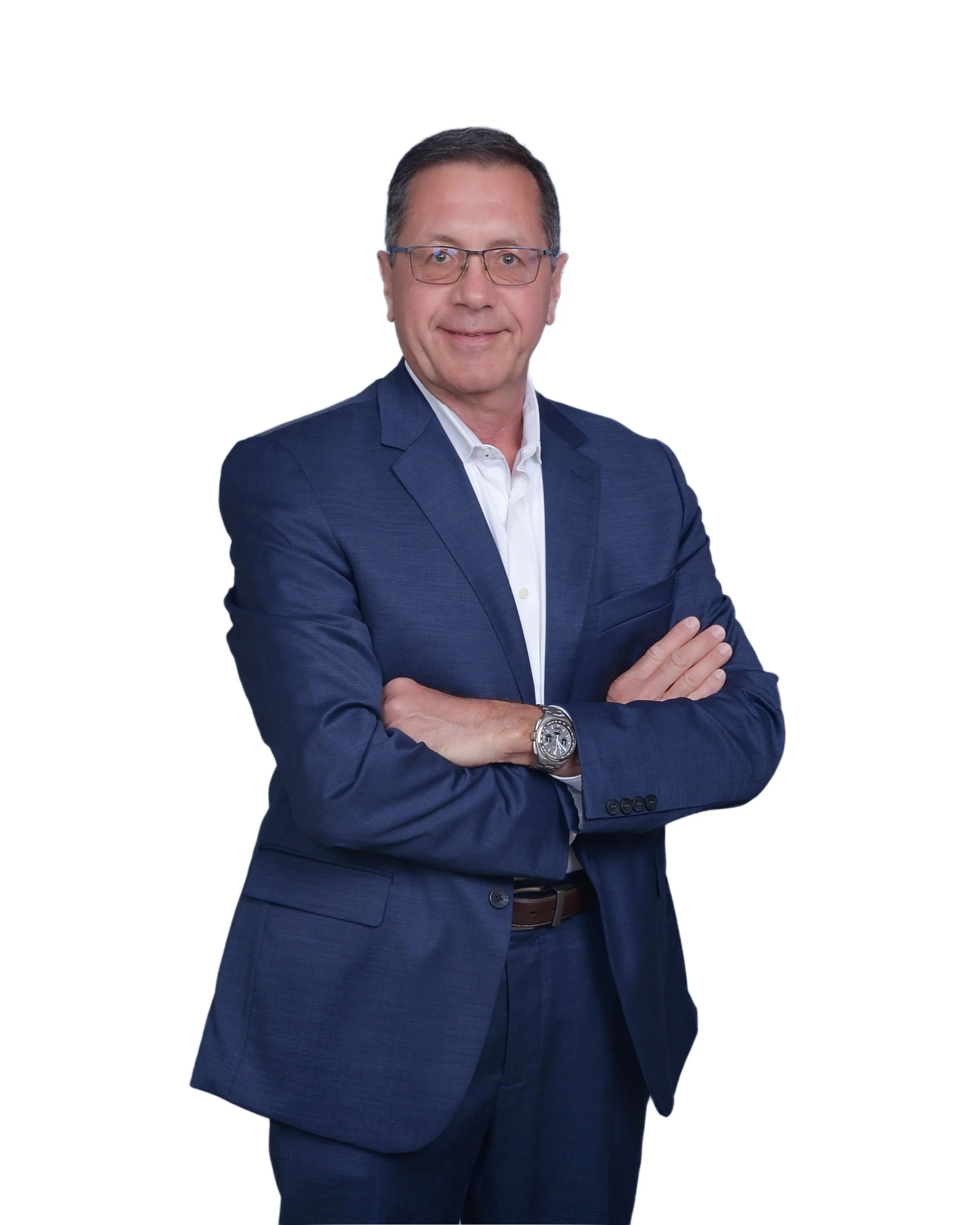 Thomas Hofen standing in a blue suit